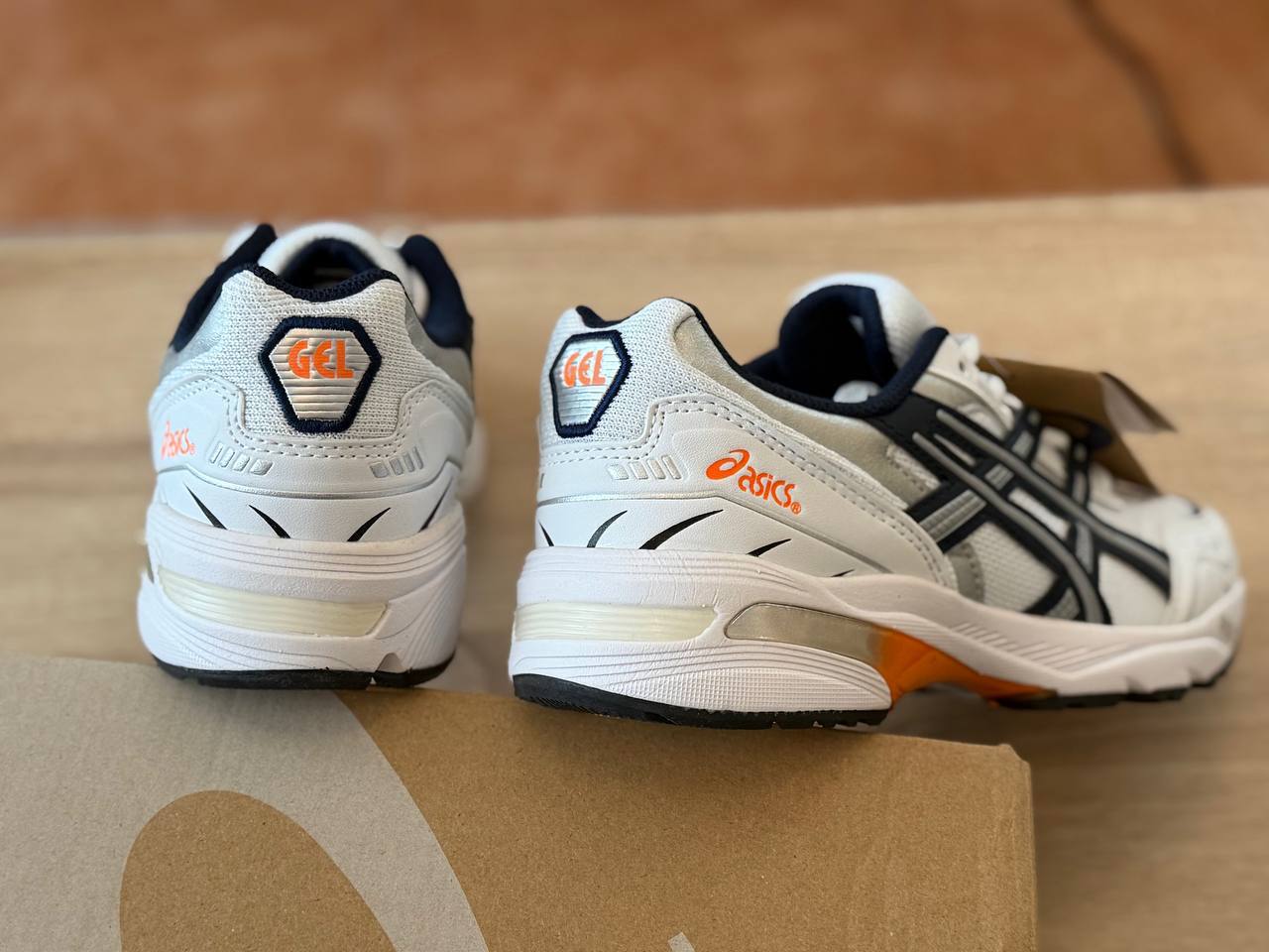 ASICS white low-top running trainers
