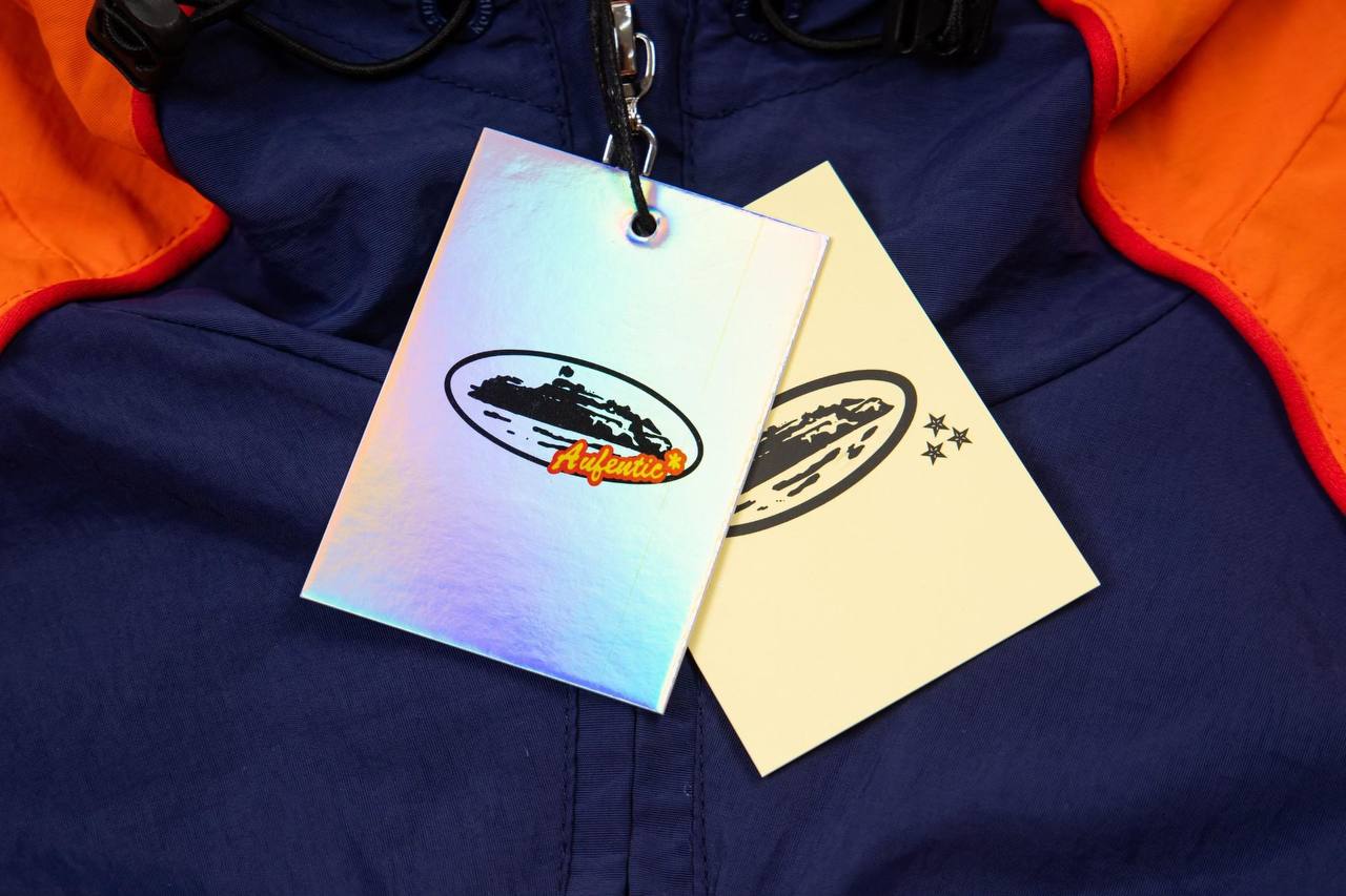 Corteiz orange hooded windbreaker jacket