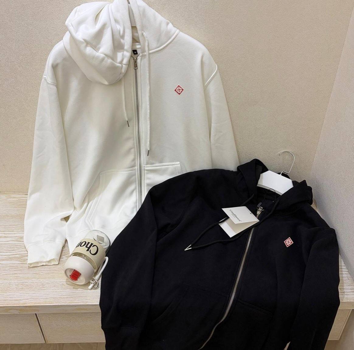 Black hooded zip-up jacket